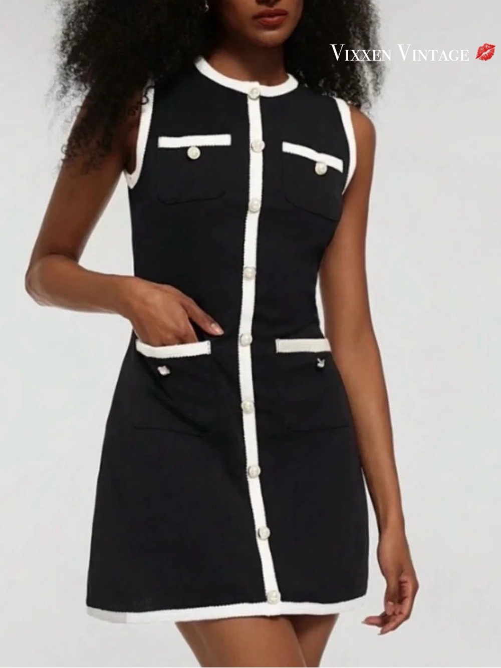 ZESICA SLEEVELESS PEARL BUTTON FRONT MINI KNIT DRESS IN BLACK